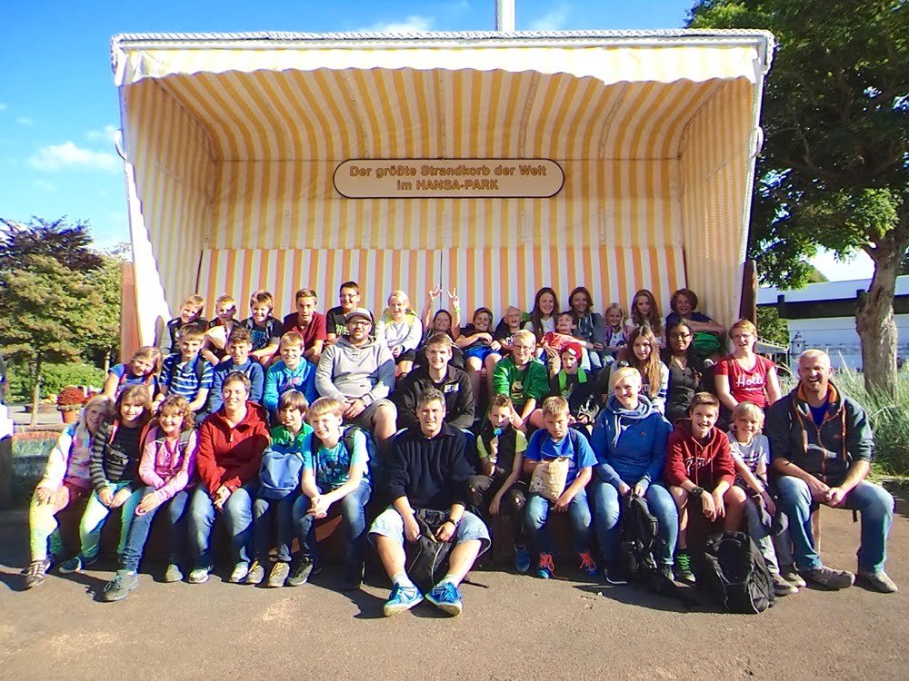 a group of people posing for a photo
